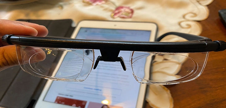 Vision Pro-glasses-holding-them-in-front-of-a-smartphone